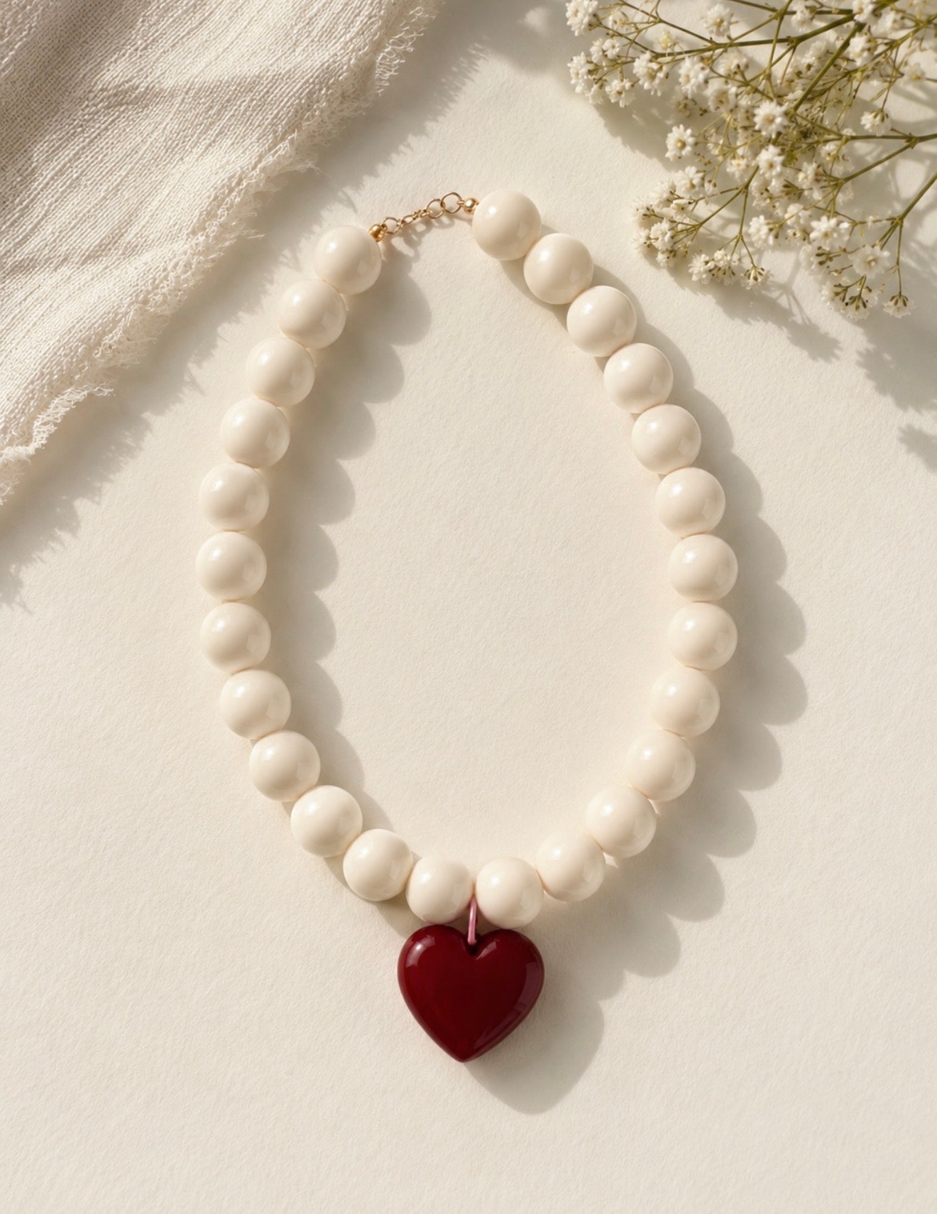 COLLAR MARFIL CORAZON ROJO