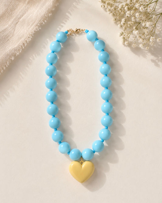 COLLAR AZUL CON CORAZON MARFIL