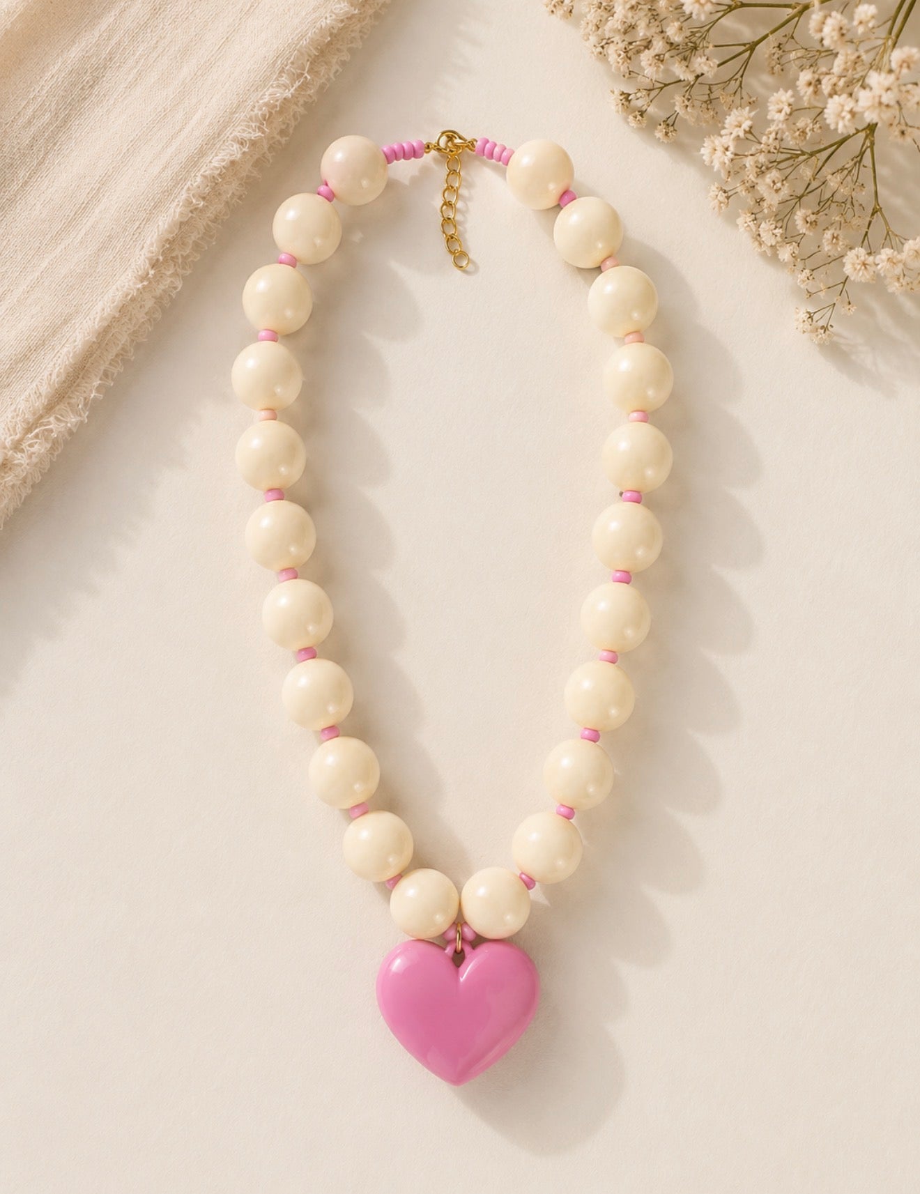 COLLAR MARFIL CORAZON ROSADO