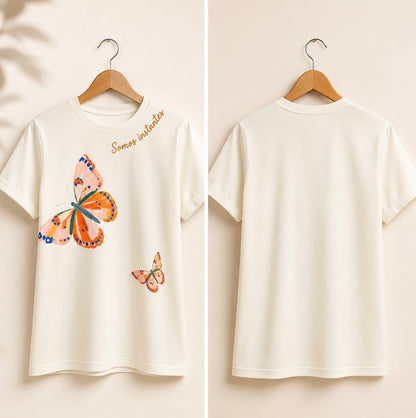 CAMISETA SOMOS INSTANTES MARFIL